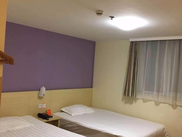 7Days Inn Changshou Road Subway station : photo 4 de la chambre chambre affaires lits jumeaux