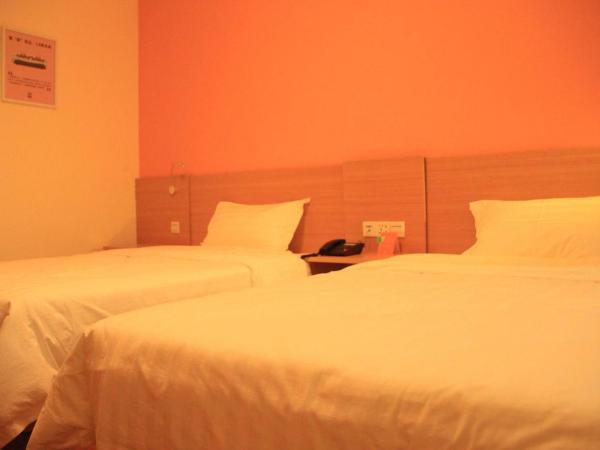 7Days Inn Dongguan Guanhui City Rail Dalang Town Station Branch : photo 3 de la chambre chambre lits jumeaux confortable