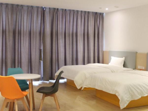 7Days Inn Chongqing Longtou Temple North Train Station North Plaza Branch : photo 2 de la chambre chambre lits jumeaux