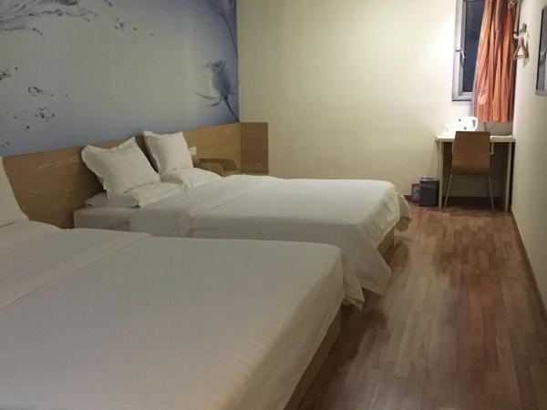 7Days Inn Guangzhou Tianhe Tangxia Junjing Huayuan : photo 1 de la chambre chambre affaires lits jumeaux