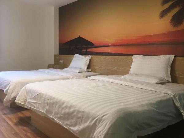 7Days Inn Guangzhou Tianhe Tangxia Junjing Huayuan : photo 1 de la chambre chambre lits jumeaux
