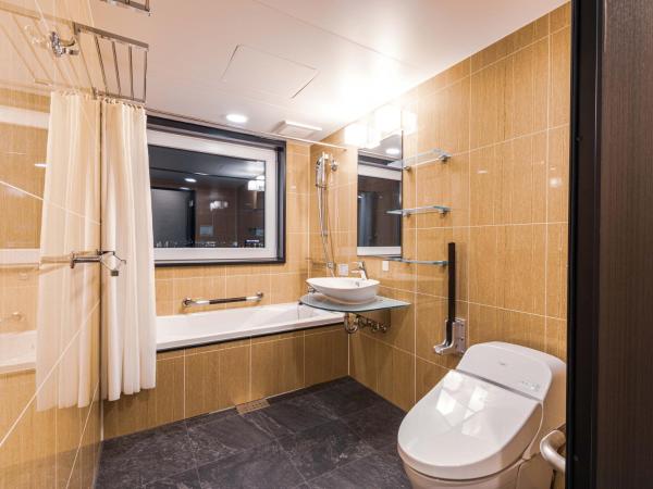APA Hotel Shin Osaka Ekimae : photo 5 de la chambre chambre lits jumeaux de luxe - non-fumeurs