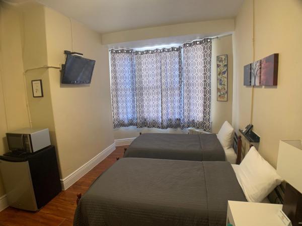 Orange Village Hostel : photo 6 de la chambre chambre lits jumeaux avec douche 