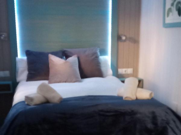 Villa Palma : photo 4 de la chambre chambre quadruple avec salle de bains