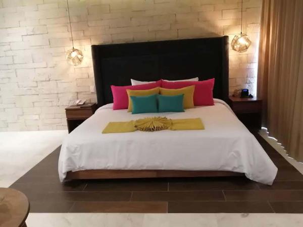 Hotel Beló Isla Mujeres - All Inclusive : photo 7 de la chambre suite junior de luxe avec 1 lit king-size