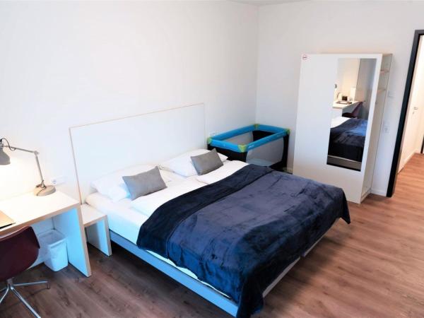 Gästehaus Hansa Residence : photo 2 de la chambre chambre double avec lit d'appoint