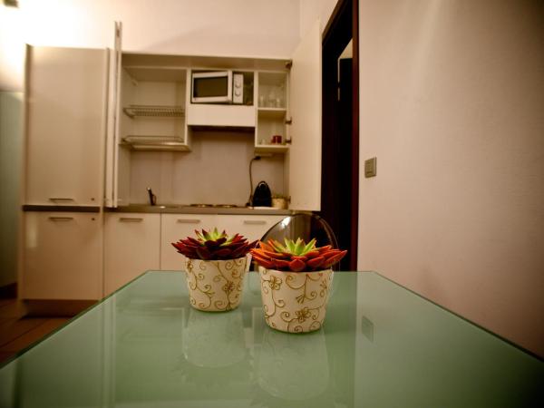 Parizzi Suites & Restaurant : photo 5 de la chambre appartement 1 chambre avec vue sur cour 