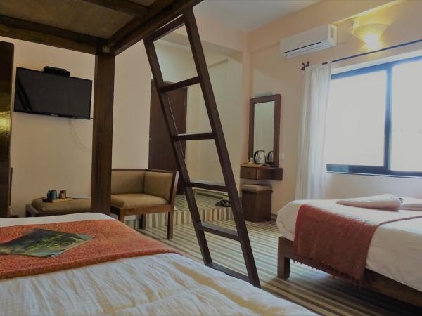 Hotel Karuna : photo 3 de la chambre chambre familiale