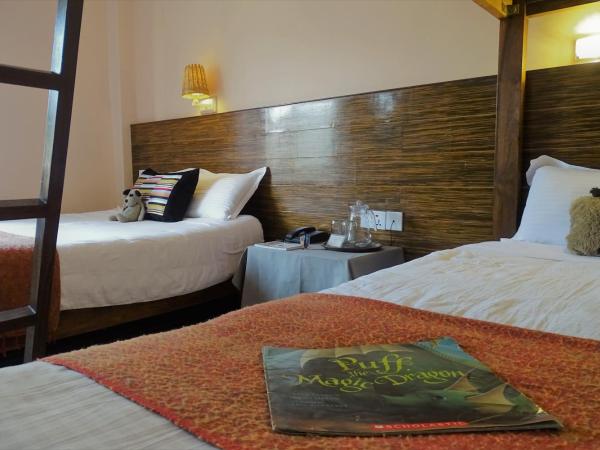 Hotel Karuna : photo 7 de la chambre chambre familiale