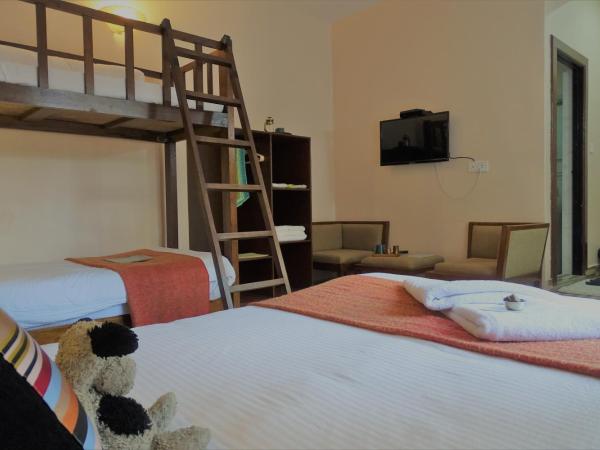 Hotel Karuna : photo 2 de la chambre chambre familiale