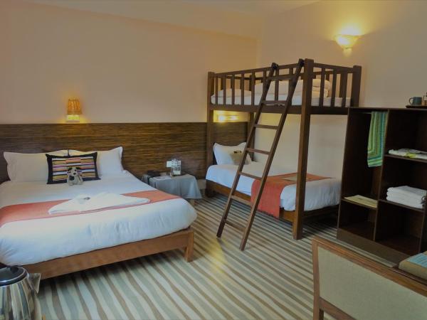 Hotel Karuna : photo 1 de la chambre chambre familiale