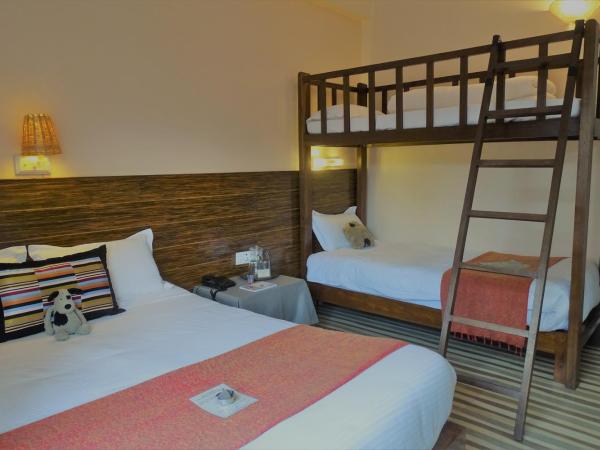 Hotel Karuna : photo 10 de la chambre chambre familiale