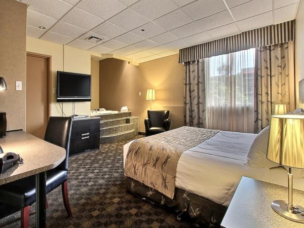 Hotel Classique : photo 1 de la chambre suite lit king-size avec baignoire spa