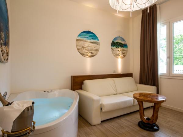 Rimini Suite Hotel : photo 1 de la chambre suite junior - vue sur piscine