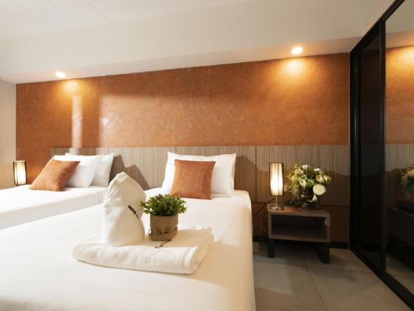 The Home Hotel SHA : photo 3 de la chambre chambre lits jumeaux deluxe