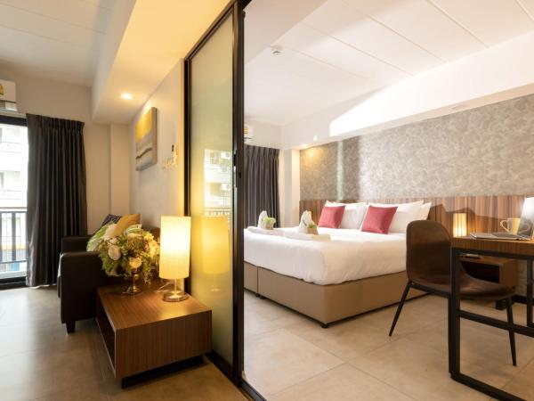 The Home Hotel SHA : photo 1 de la chambre suite lit queen-size
