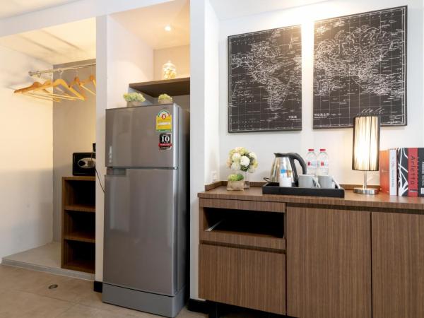 The Home Hotel SHA : photo 9 de la chambre suite lit queen-size