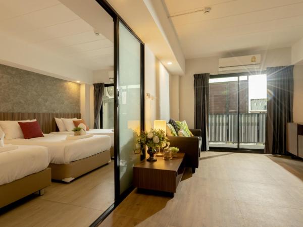 The Home Hotel SHA : photo 2 de la chambre chambre triple