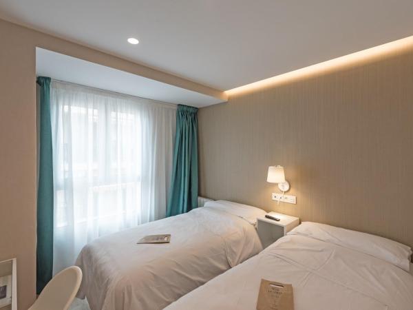 La Lonja : photo 1 de la chambre chambre lits jumeaux