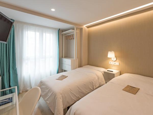 La Lonja : photo 9 de la chambre chambre lits jumeaux