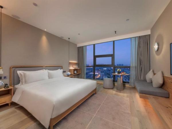 Westlake Art Hotel : photo 1 de la chambre premium city view king room