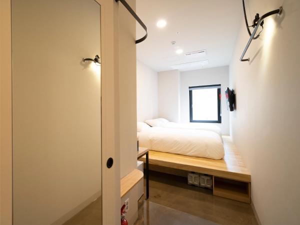 Wegoinn Hostel : photo 2 de la chambre chambre triple