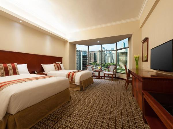 Ramada by Wyndham Pearl Guangzhou-Canton Fair Free Shuttle Bus : photo 3 de la chambre chambre affaires lits jumeaux