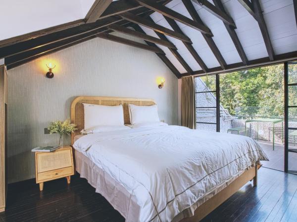 Shanghai Downtown Hills Boutique Guesthouse - Near Metro Line 7, Exit 3, Changping Road : photo 1 de la chambre yunnan family room with terrace
