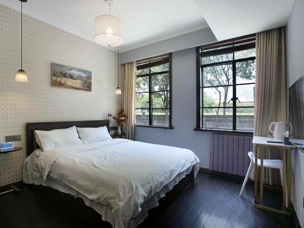 Shanghai Downtown Hills Boutique Guesthouse - Near Metro Line 7, Exit 3, Changping Road : photo 10 de la chambre kenya queen room with garden view