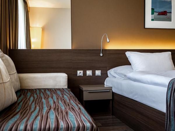 Expo Hotel : photo 6 de la chambre chambre double ou lits jumeaux standard avec lit d'appoint