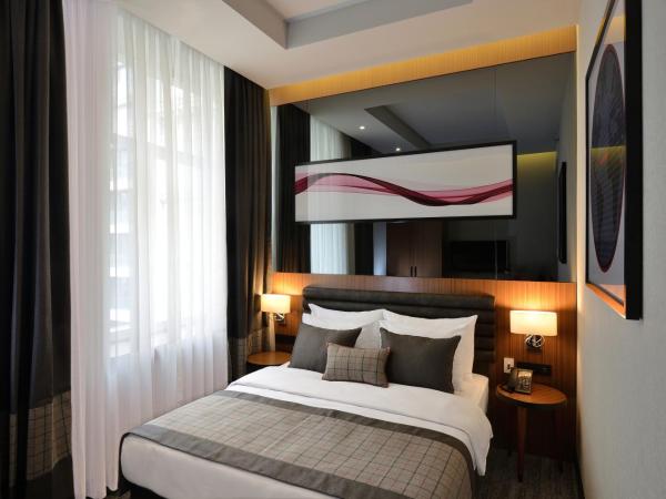 Ramada by Wyndham Budapest City Center : photo 6 de la chambre chambre lit queen-size supérieure - non-fumeurs