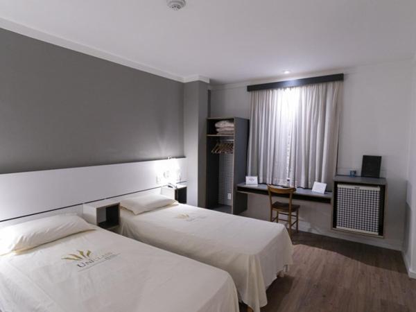 Uniclass Hotel Pinheiros : photo 4 de la chambre chambre quadruple