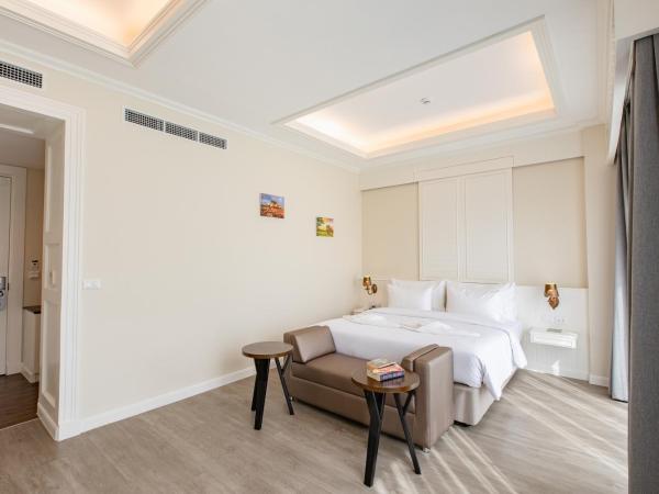 Siam Tharadol SHA Extra Plus : photo 7 de la chambre chambre lit king-size premier