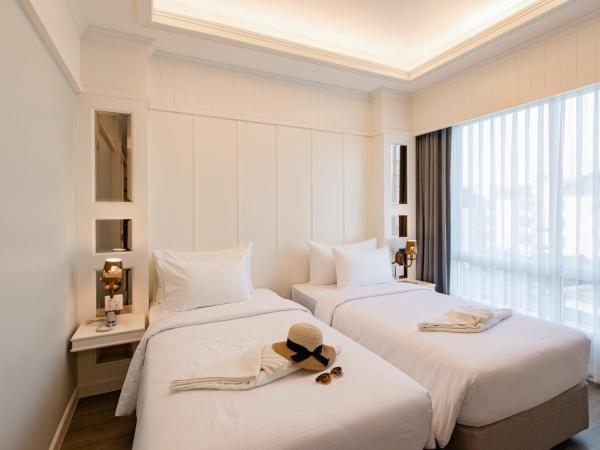 Siam Tharadol SHA Extra Plus : photo 6 de la chambre chambre lits jumeaux premier