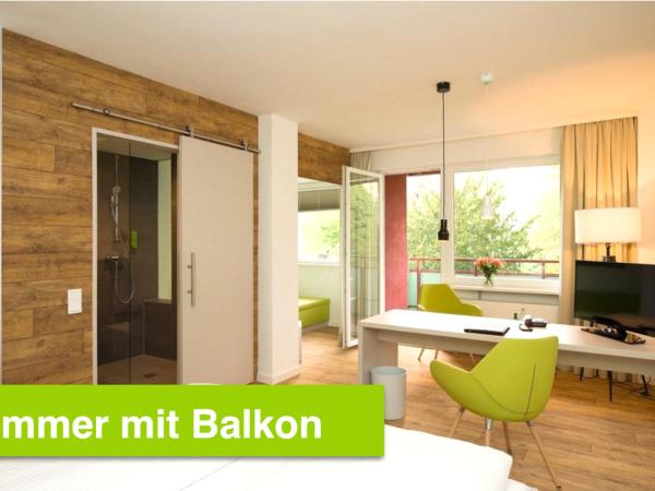 Hotel Carolinenhof : photo 10 de la chambre chambre double confort avec balcon - côté jardin
