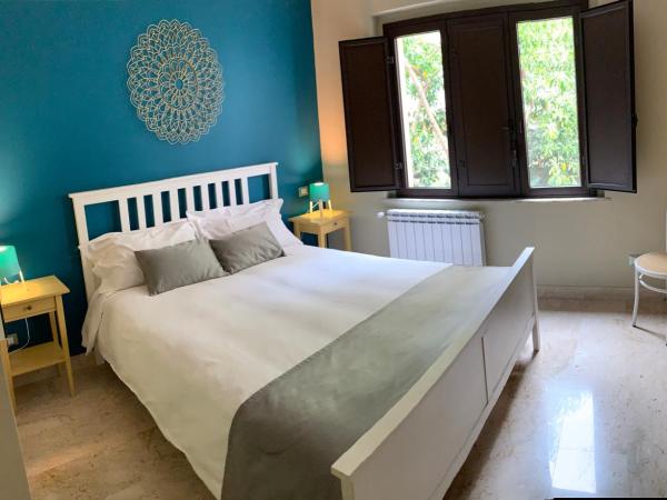 Corte dei medici - Palace : photo 2 de la chambre chambre double - vue sur jardin