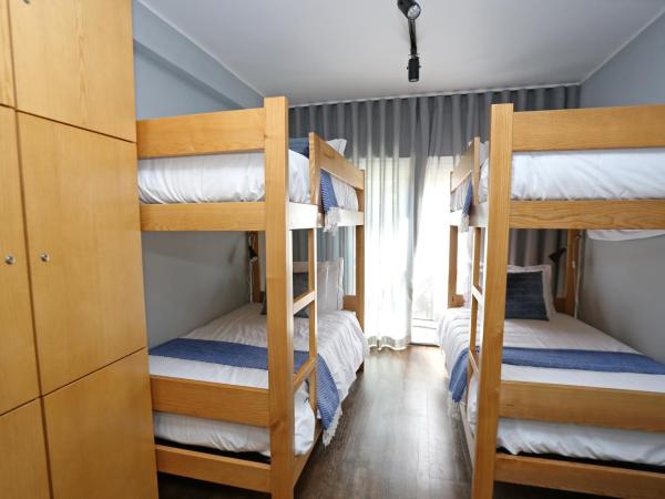 HI Setubal - Pousada de Juventude - CASA DO LARGO : photo 1 de la chambre lit dans dortoir pour femmes de 4 lits