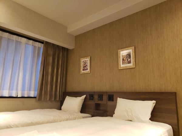 Welina Hotel Premier Nakanoshima EAST : photo 6 de la chambre chambre lits jumeaux