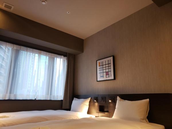 Welina Hotel Premier Nakanoshima EAST : photo 4 de la chambre chambre lits jumeaux