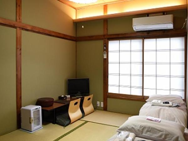 Ryokan Sansuiso : photo 9 de la chambre chambre lits jumeaux de style japonais avec salle de bains commune