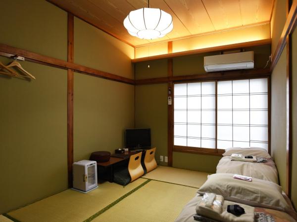 Ryokan Sansuiso : photo 4 de la chambre chambre lits jumeaux de style japonais avec salle de bains commune