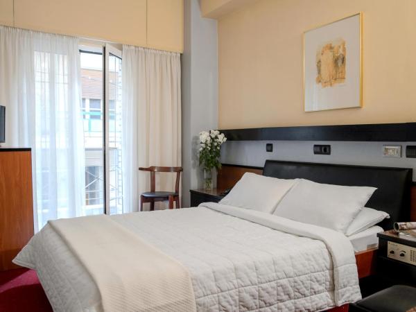 Victory Inn : photo 8 de la chambre chambre double avec petit balcon