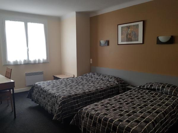 Hôtel Saint Sébastien : photo 1 de la chambre chambre triple