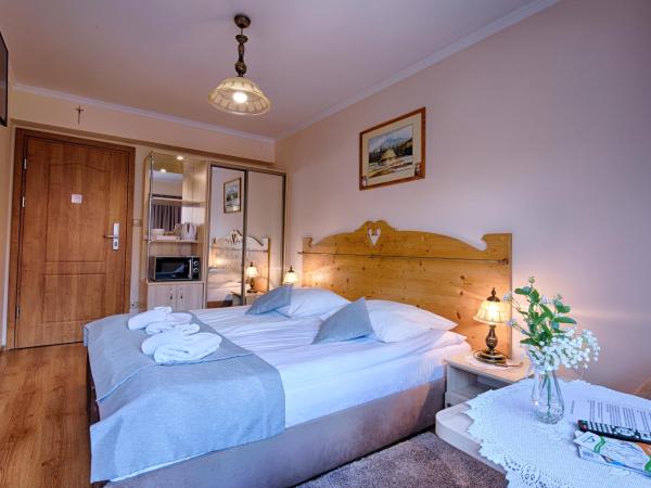 Pensjonat Dawidek : photo 2 de la chambre chambre double avec balcon