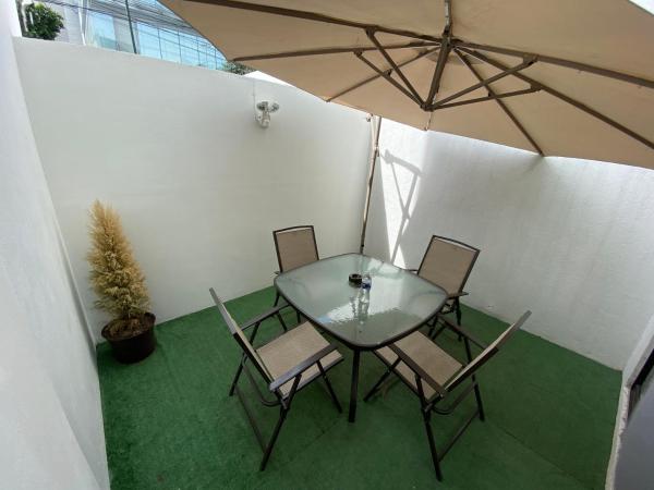 Suites Arboleda 215 : photo 6 de la chambre chambre double avec terrasse