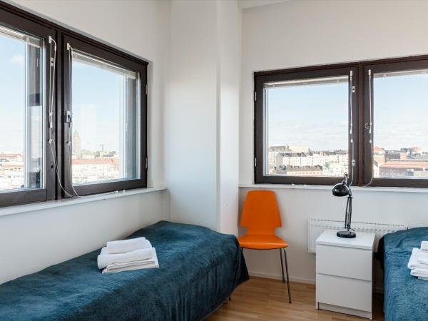 Sky Hostel Helsinki : photo 2 de la chambre chambre lits jumeaux avec salle de bains commune