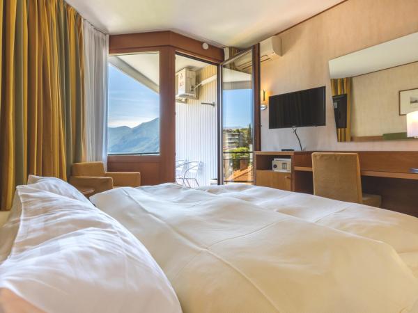 Hotel Delfino Lugano : photo 2 de la chambre chambre lit queen-size Élégante