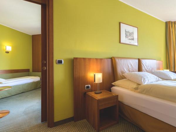 Hotel Delfino Lugano : photo 4 de la chambre suite junior avec vue partielle sur le lac
