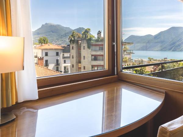 Hotel Delfino Lugano : photo 3 de la chambre suite junior avec vue partielle sur le lac