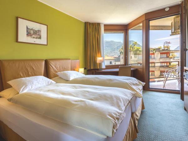 Hotel Delfino Lugano : photo 2 de la chambre suite junior avec vue partielle sur le lac